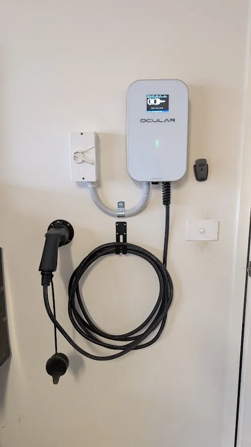 Ocular EV charger with isolator switch installed in a garage, Geelong